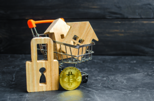 carrinho com casas e um cadeado e uma criptomoeda de bitcoin
